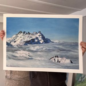 Print of Dents du Midi. Cloud inversion. Artist is behind, holding print in studio. Giclee on fine art bamboo paper.