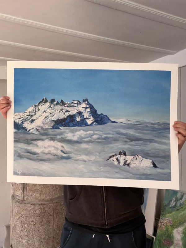 Print of Dents du Midi. Cloud inversion. Artist is behind, holding print in studio. Giclee on fine art bamboo paper.